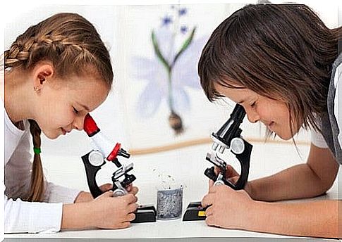 Two children perform experiments 