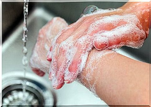 person washing hands