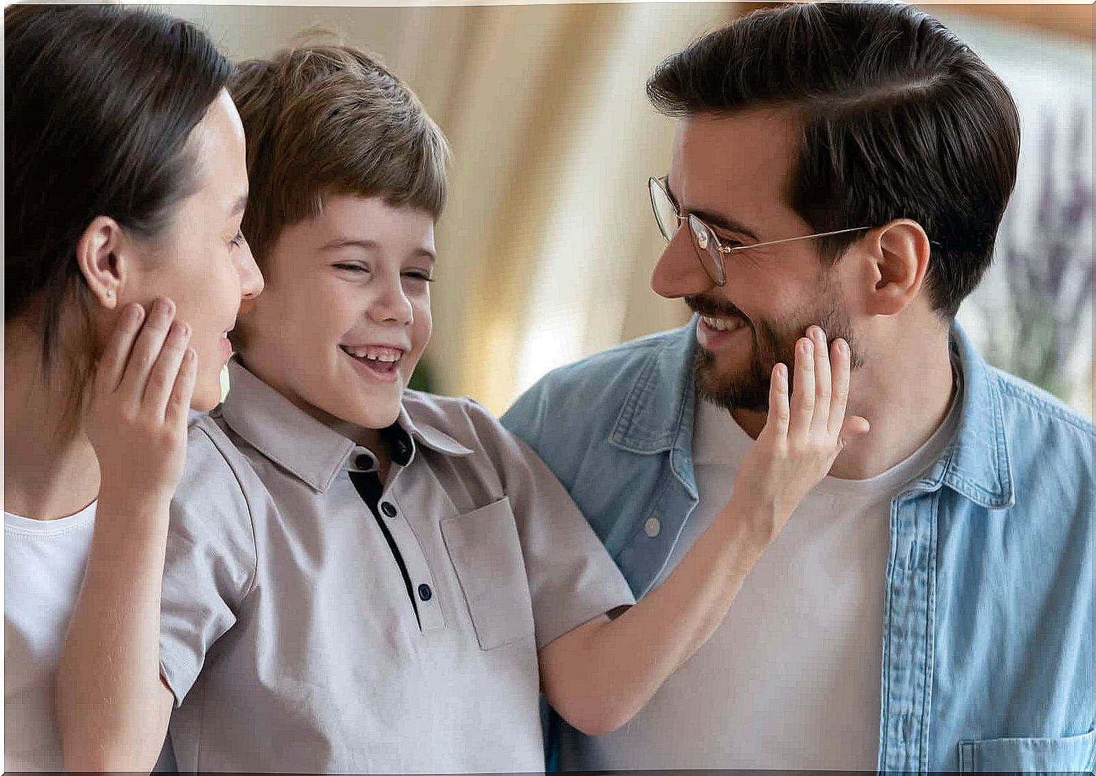 Parents with smiling child