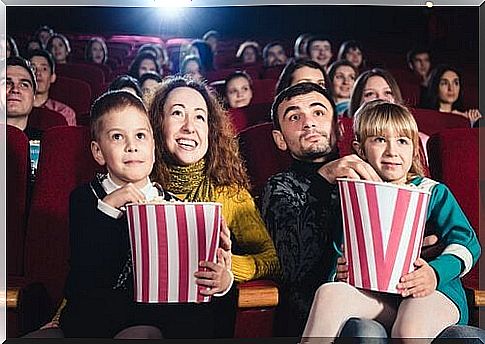 parents with children in cinema