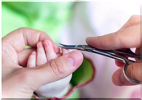 Baby gets nails cut off