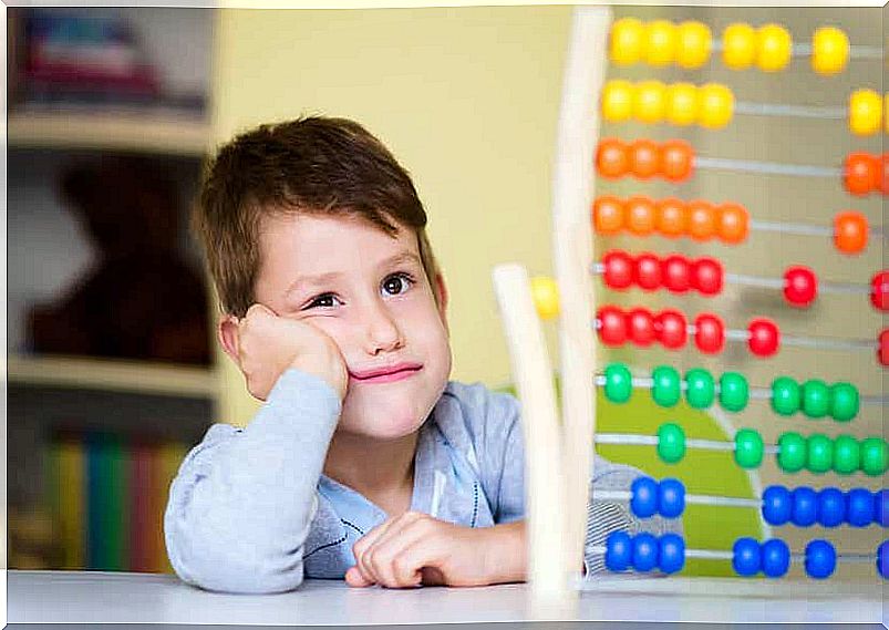 A child sitting and getting bored