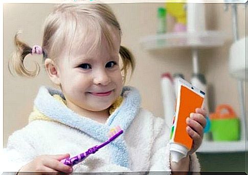 Girl getting ready to brush teeth