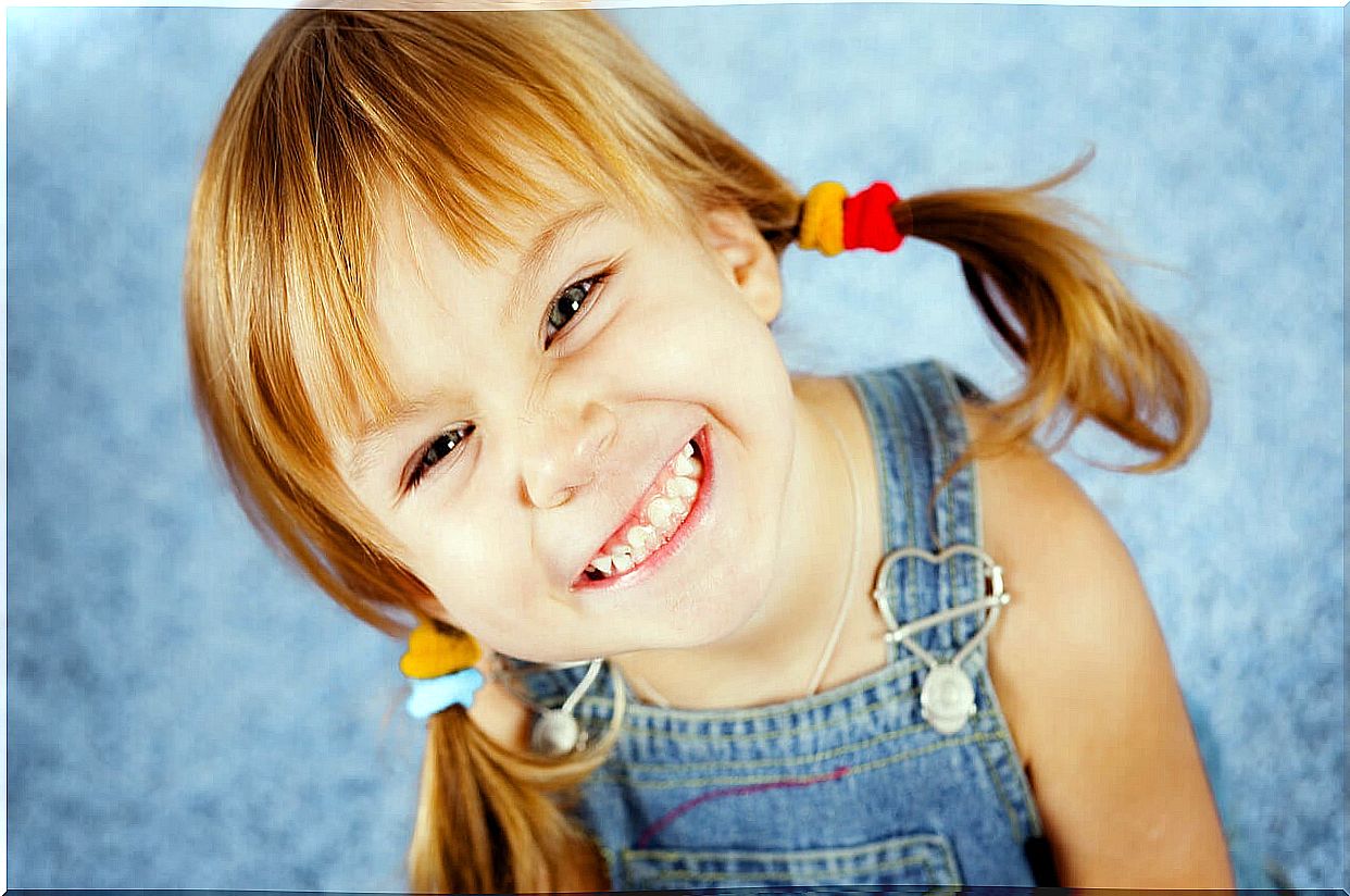 smiling girl with rat tails