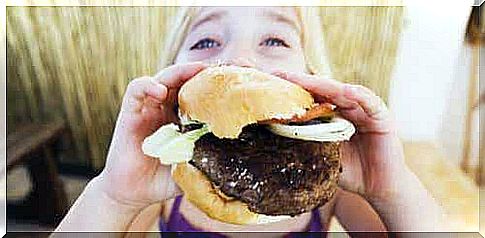 Girl eating burger