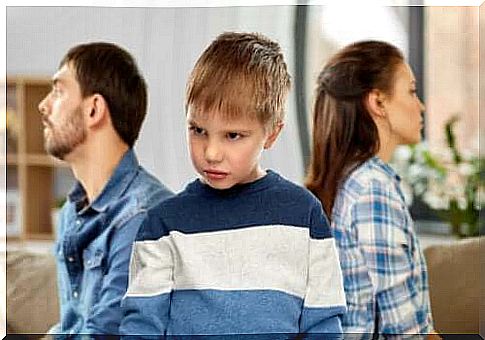 offended child with parents in the background