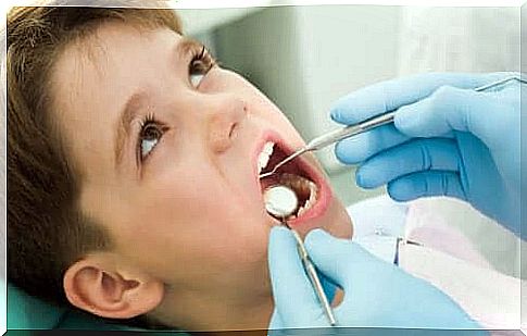 How to take care of your baby's baby teeth: Boy for dental checkup.