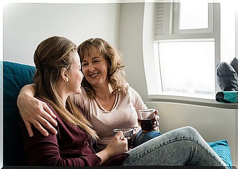 mother and daughter drinking coffee