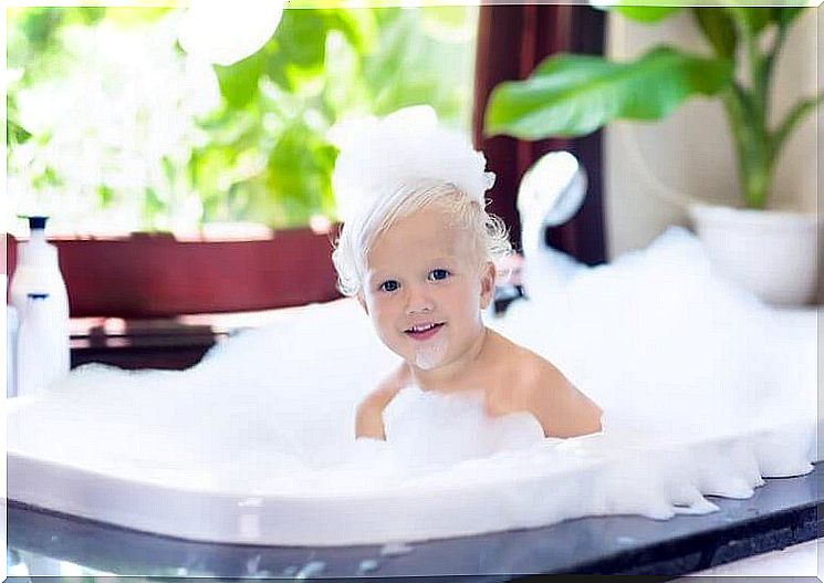 a child in a bubble bath