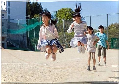 children playing with skipping rope