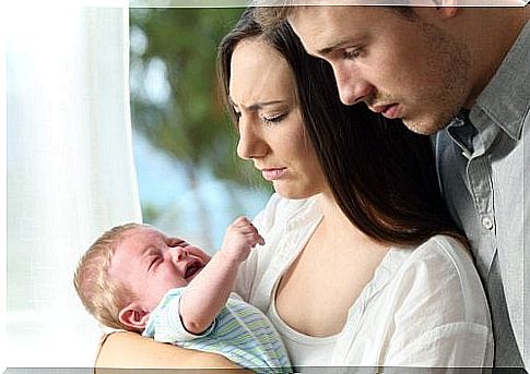 Parents with crying baby