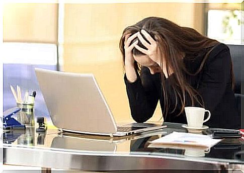 Woman is stressed at work 