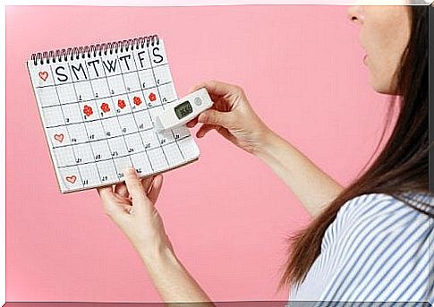 woman standing with calendars