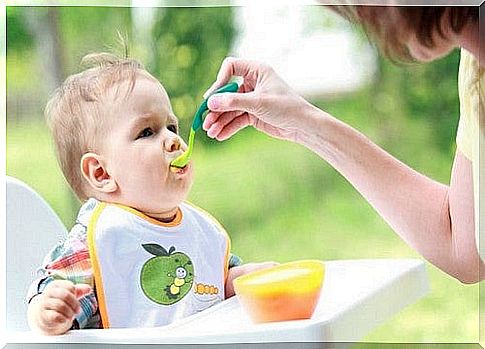 baby gets pureed with spoon